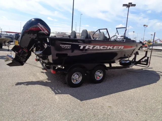 Slide: The Image of 2025 Tracker Targa V-18 Combo boat on trailer in parking lot. - 3