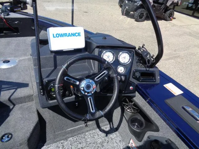Slide: The Image of 2025 Tracker Targa V-18 Combo boat dashboard with Lowrance navigation system. - 7