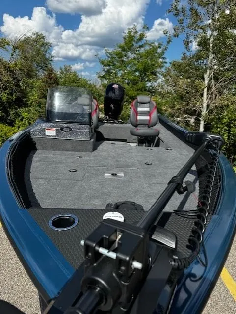 Slide: The Image of 2024 Ranger VS1782SC Angler boat with seating, steering console, and trolling motor. - 2