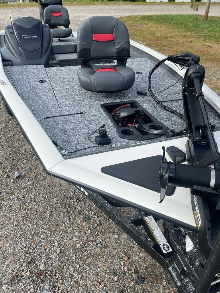 Slide: The Image of 2025 Tracker Pro Team 195 Tournament Edition boat interior with seating and controls. - 2