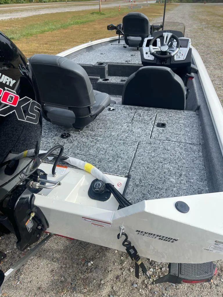 Slide: The Image of 2025 Tracker Pro Team 195 Tournament Edition boat with seating and fishing equipment. - 3