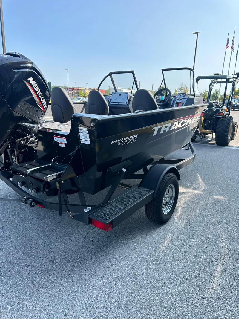 Slide: The Image of 2025 Tracker Pro Guide V-175 WT boat on trailer, outdoor display. - 4