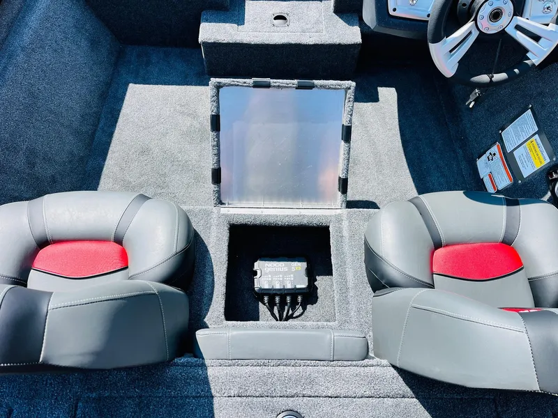 Slide: The Image of 2025 Tracker Pro Team 175 boat interior with dual seats and control panel. - 22