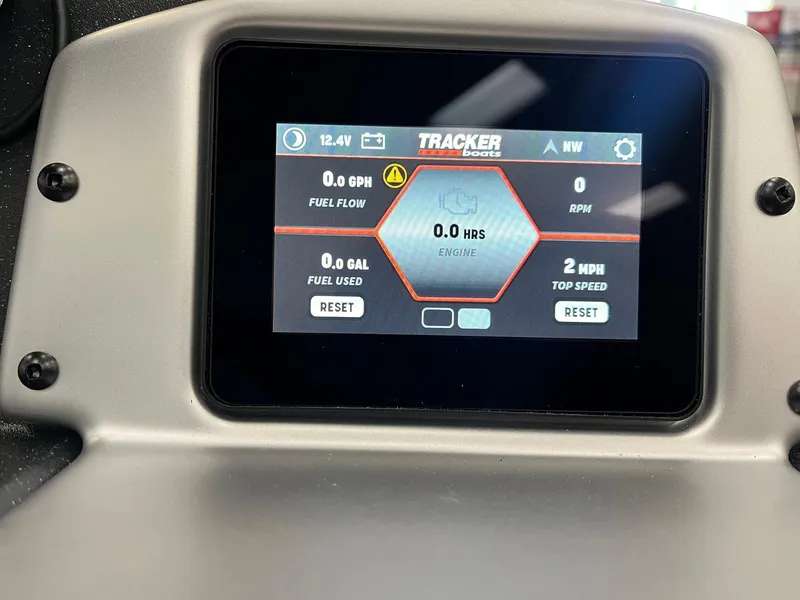 Slide: The Image of 2025 Tracker Pro Team 175 dashboard display showing fuel flow, engine hours, and speed. - 27