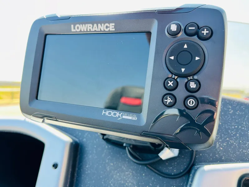 Slide: The Image of Lowrance Hook fish finder on 2025 Tracker Pro Team 175 boat dashboard. - 29