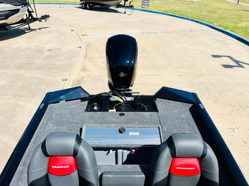 Slide: The Image of 2025 Tracker Pro Team 175 boat with dual seats and outboard motor. - 32