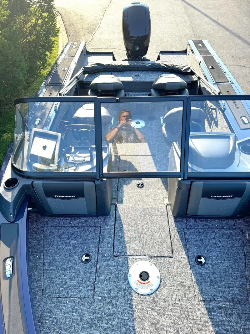 Slide: The Image of 2025 Tracker Targa V-18 Combo boat interior with seating and windshield. - 3