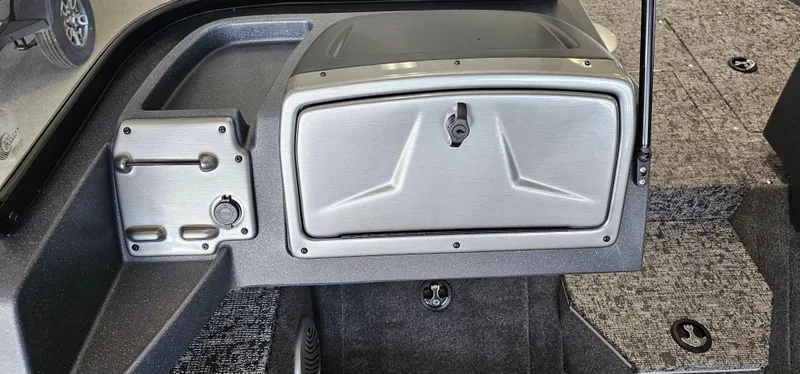 Slide: The Image of 2025 Tracker Pro Guide V-175 WT boat dashboard with storage compartment. - 6