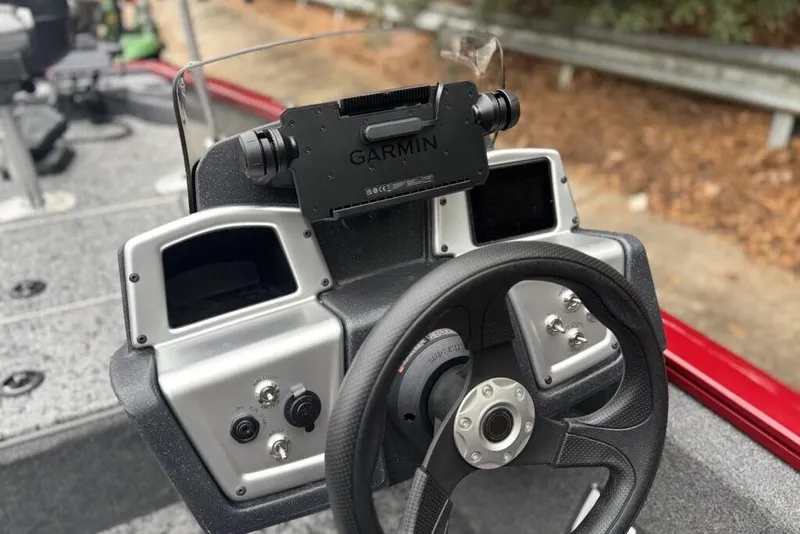Slide: The Image of Dashboard of 2025 Tracker Pro Team 175 Crappie Edition with Garmin device. - 84