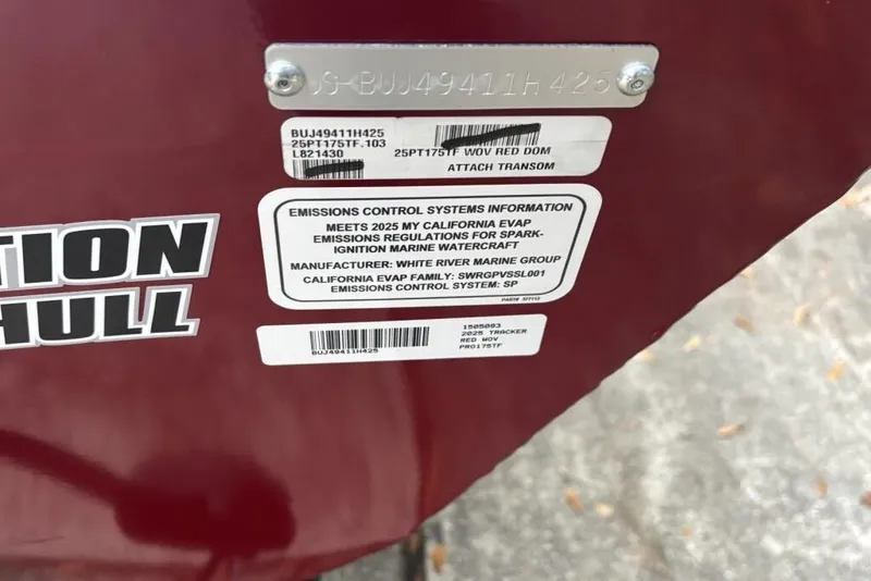 Slide: The Image of 2025 Tracker Pro Team 175 Crappie Edition boat with emissions control information labels. - 88