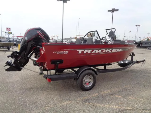 Slide: The Image of 2025 Tracker Pro Guide V-175 WT boat on trailer in parking lot. - 5