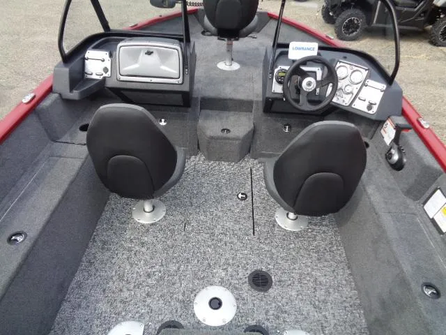 Slide: The Image of 2025 Tracker Pro Guide V-175 WT boat interior with dual seats and control panel. - 6