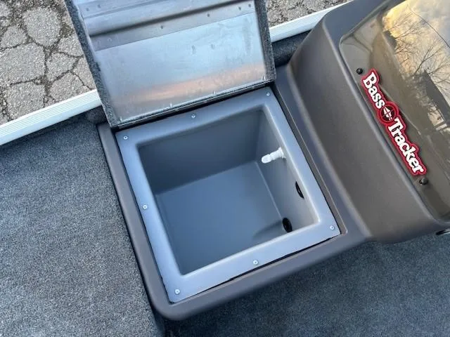 Slide: The Image of 2025 Tracker Bass Tracker Classic XL livewell compartment with open lid. - 6