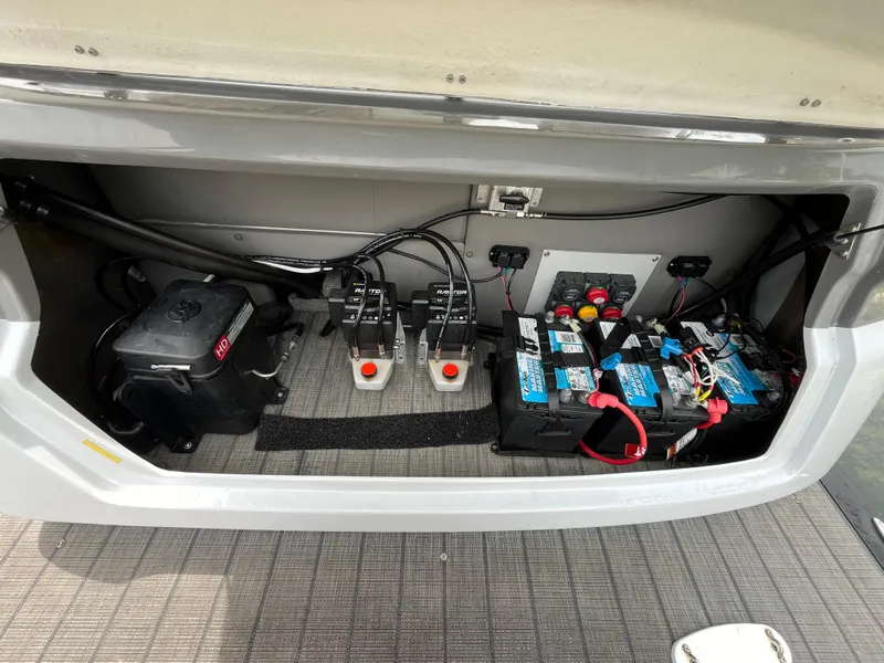 Slide: The Image of 2021 Tahoe Grand Tahoe ELW battery compartment with wiring and components. - 14