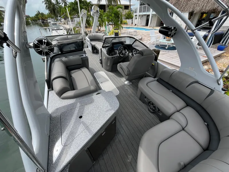 Slide: The Image of Luxurious 2021 Tahoe Grand Tahoe ELW boat interior with sleek seating and modern design. - 20