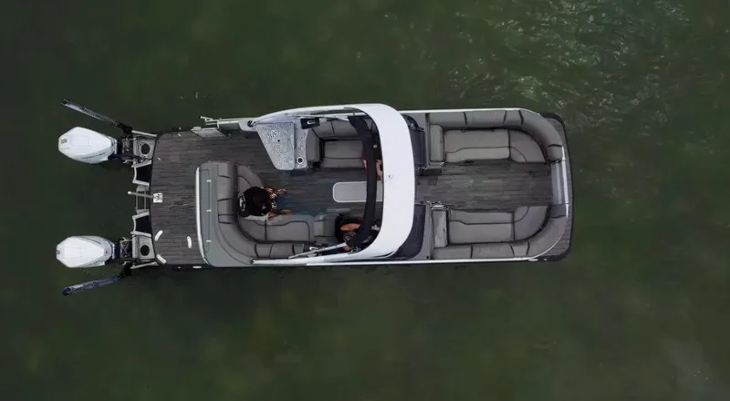 Slide: The Image of Aerial view of 2021 Tahoe Grand Tahoe ELW boat on water. - 44