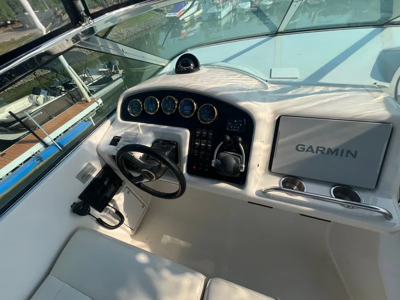 Slide: The Image of Interior helm of 2001 Carver 530 Voyager with Garmin navigation system. - 24