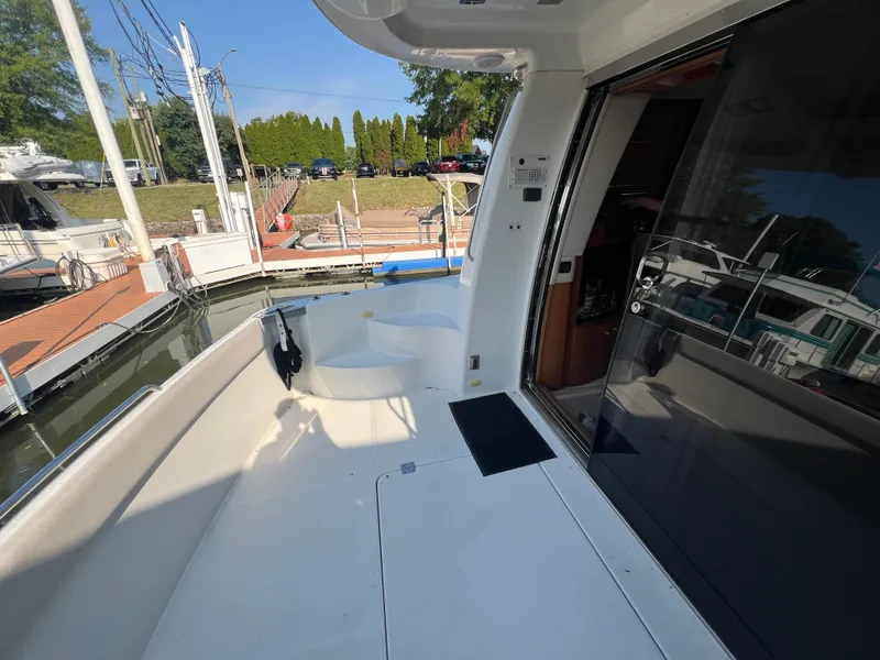 Slide: The Image of 2001 Carver 530 VOYAGER yacht deck with marina view. - 28