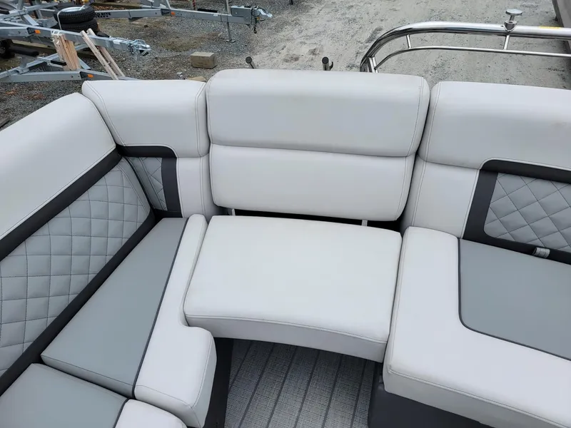 Slide: The Image of 2025 Godfrey AquaPatio 255 ULC boat seating with elegant gray upholstery. - 17