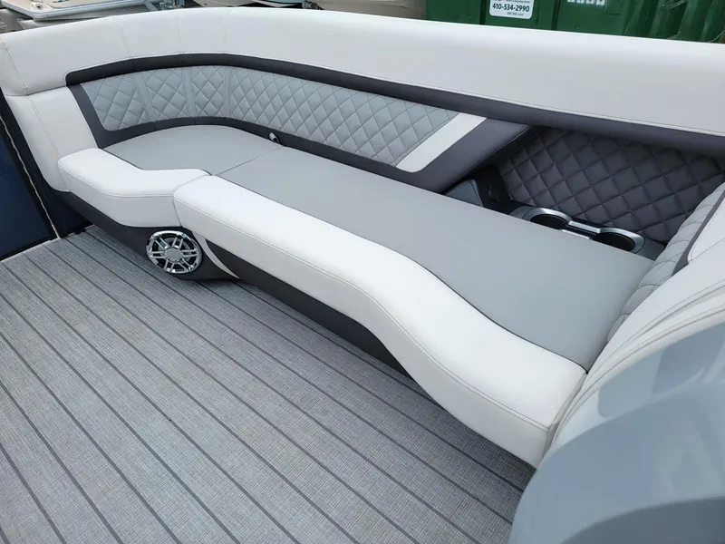 Slide: The Image of Luxury seating on 2025 Godfrey AquaPatio 255 ULC pontoon boat, featuring modern design and comfort. - 23
