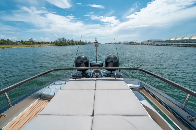 Slide: The Image of Luxurious 2017 Riva 76' Perseo yacht cruising on a serene waterway. - 19