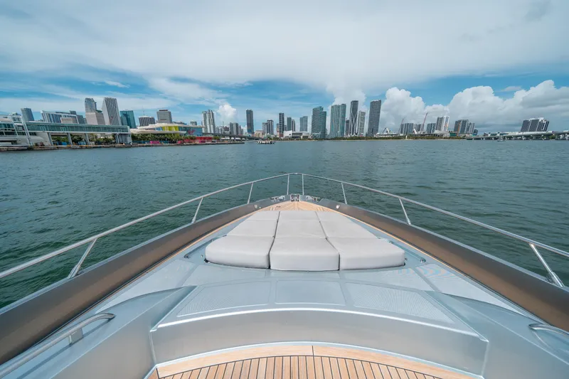 Slide: The Image of Riva 76' Perseo yacht cruising near city skyline, 2017 model. - 22