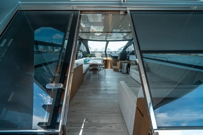 Slide: The Image of Interior view of 2017 Riva 76' Perseo yacht with modern design and spacious seating. - 25