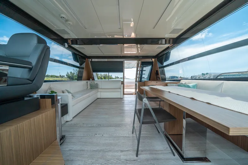 Slide: The Image of Luxurious interior of 2017 Riva 76' Perseo yacht with modern furnishings and panoramic windows. - 27
