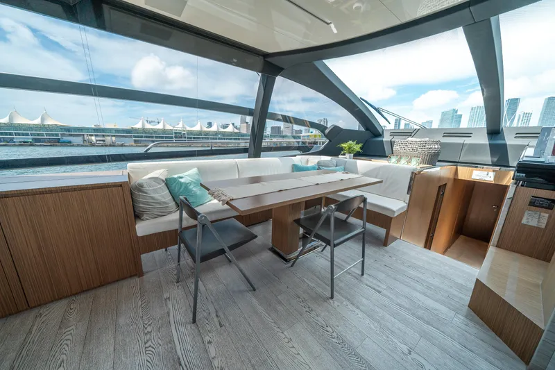 Slide: The Image of Luxurious interior of 2017 Riva 76' Perseo yacht with modern seating and dining area. - 29