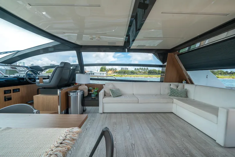 Slide: The Image of Luxurious interior of 2017 Riva 76' Perseo yacht with modern seating and panoramic views. - 30