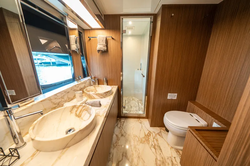 Slide: The Image of Luxurious bathroom in 2017 Riva 76' Perseo yacht with marble countertops and modern fixtures. - 41