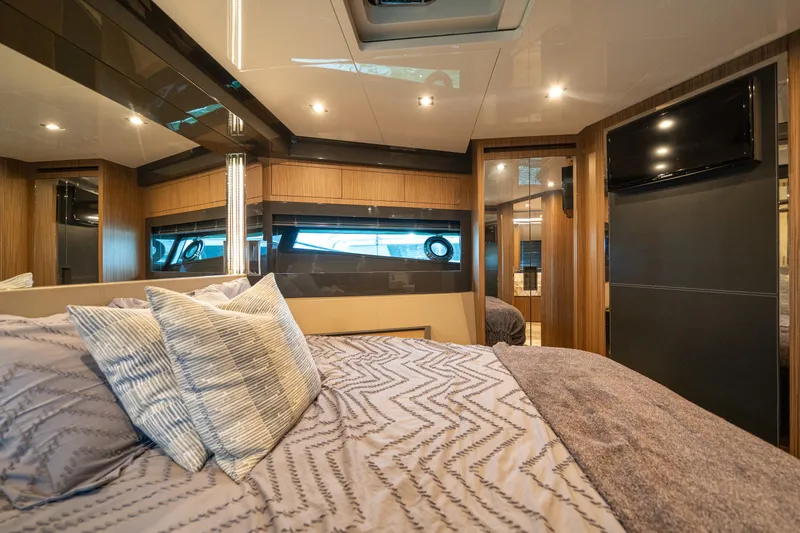Slide: The Image of Luxurious bedroom interior of 2017 Riva 76' Perseo yacht with modern design and cozy bedding. - 45