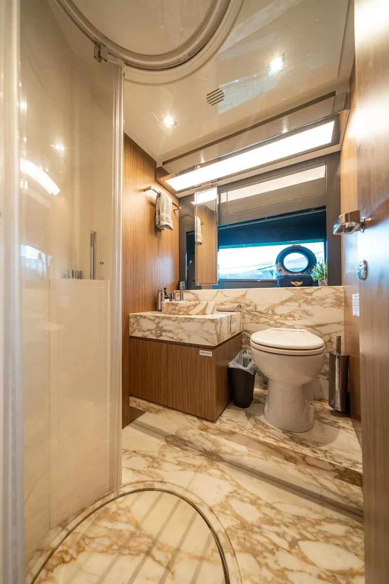 Slide: The Image of Luxurious bathroom on 2017 Riva 76' Perseo yacht with marble accents and modern fixtures. - 48