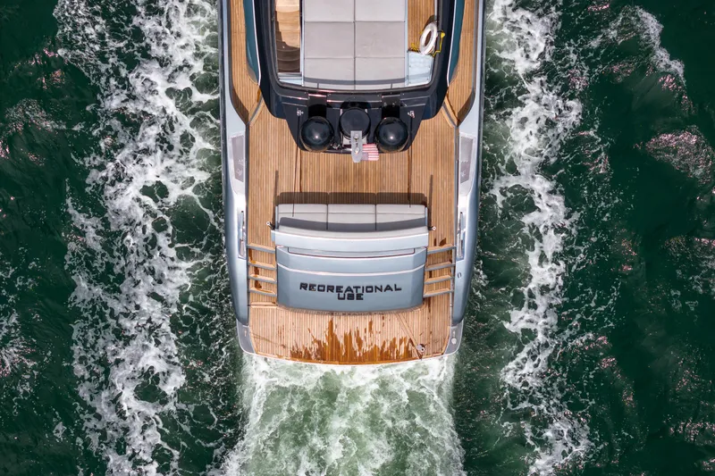 Slide: The Image of Aerial view of 2017 Riva 76' Perseo yacht cruising through green ocean waters. - 5
