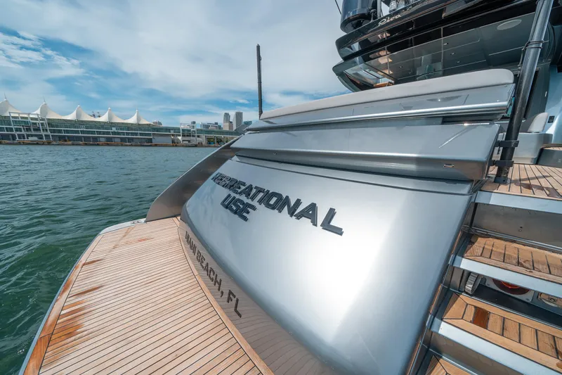 Slide: The Image of Luxury 2017 Riva 76' Perseo yacht docked by waterfront. - 8