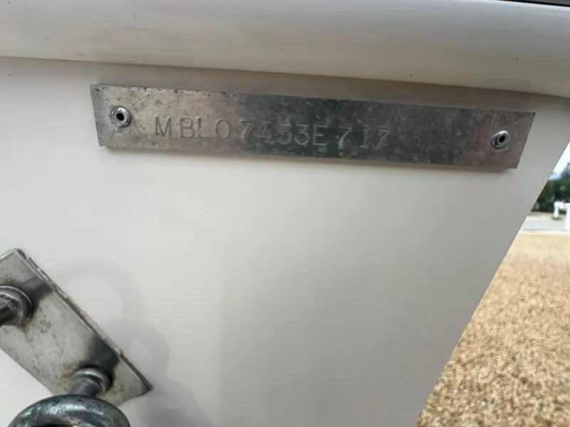 Slide: The Image of May-Craft 2300CCX 2017 boat hull identification number plate. - 12