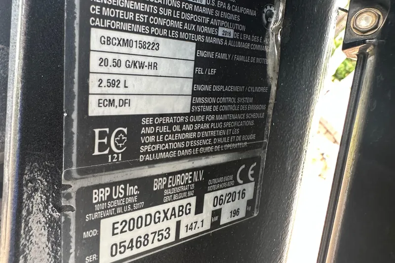 Slide: The Image of Close-up of a 2017 May-Craft 2300CCX engine specifications label. - 13