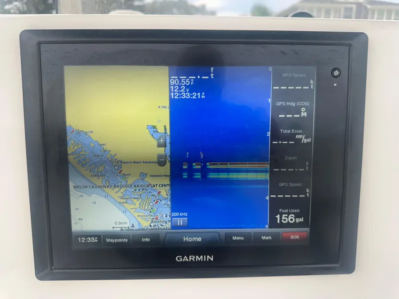 Slide: The Image of Garmin marine GPS display on 2017 May-Craft 2300CCX boat, showing navigation and sonar data. - 39
