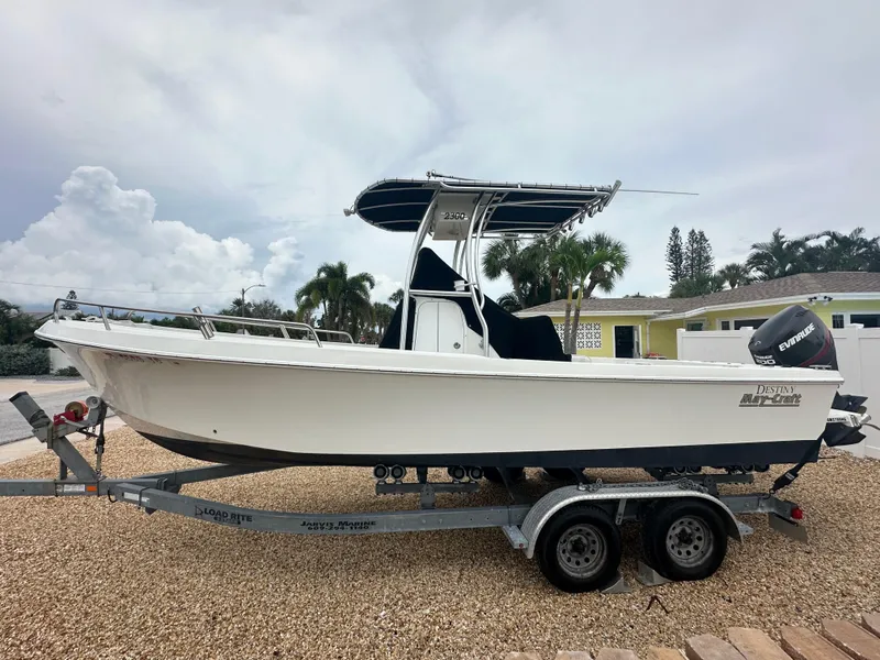 Slide: The Image of 2017 May-Craft 2300CCX boat on trailer, parked outdoors. - 4