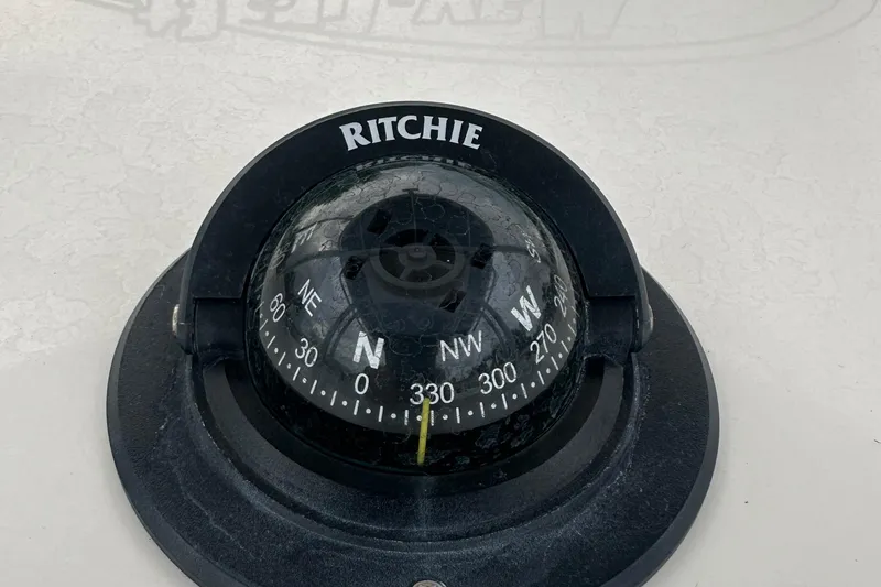 Slide: The Image of Ritchie compass on 2017 May-Craft 2300CCX boat dashboard. - 42