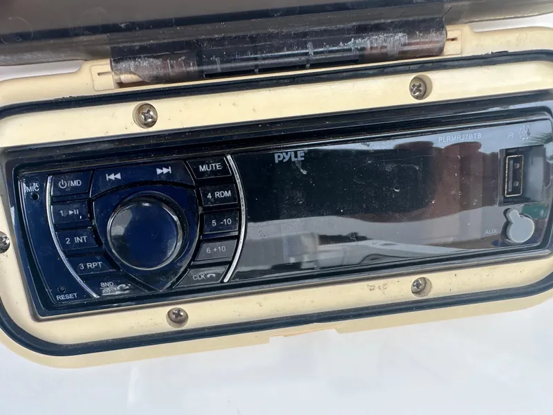 Slide: The Image of Pyle stereo system on 2017 May-Craft 2300CCX boat dashboard. - 44