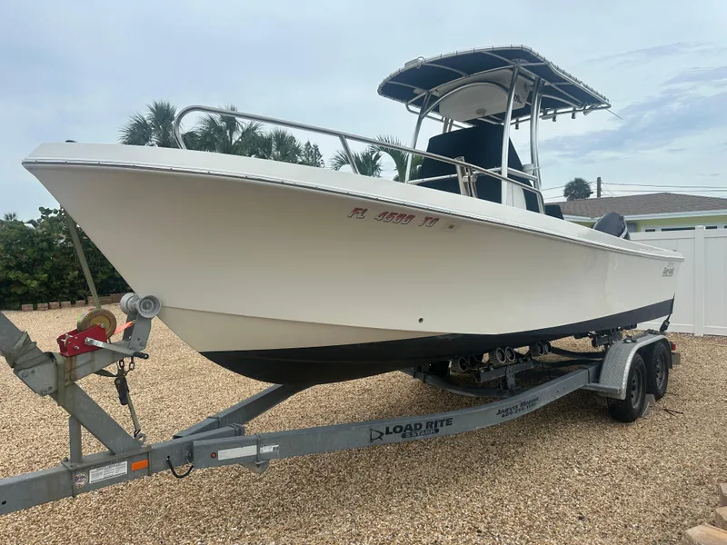 Slide: The Image of 2017 May-Craft 2300CCX boat on trailer, parked outdoors. - 5