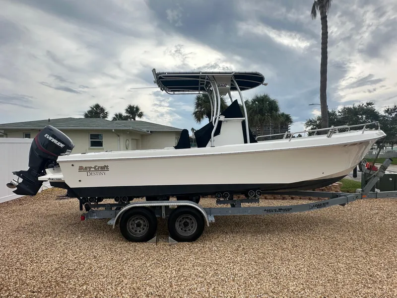 Slide: The Image of 2017 May-Craft 2300CCX boat on trailer, parked outdoors. - 6