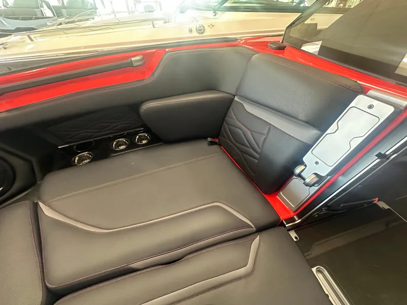 Slide: The Image of 2025 Supra SA 450 interior with black and red leather seats, modern design. - 16