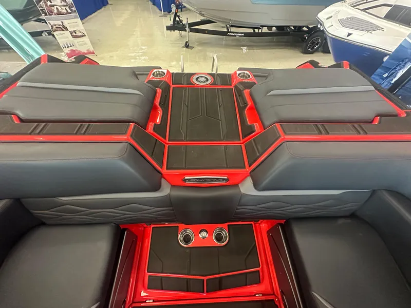 Slide: The Image of 2025 Supra SA 450 boat interior with sleek black and red design. - 22