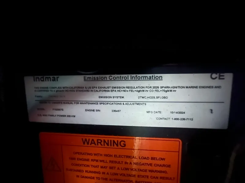 Slide: The Image of Emission control label on 2025 Supra SA 450 engine, highlighting specifications and warnings. - 31