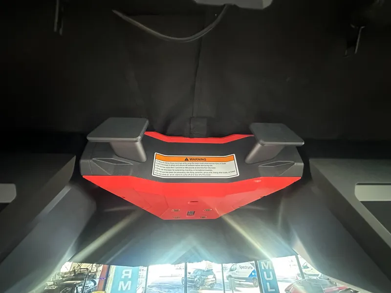 Slide: The Image of 2025 Supra SA 450 interior detail with warning label and modern design elements. - 37