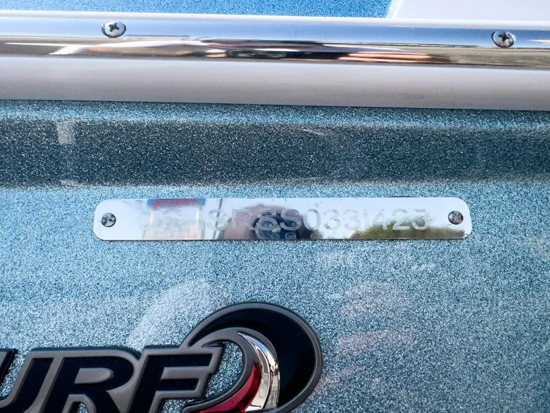 Slide: The Image of 2025 Supra SL 550 nameplate on metallic blue surface. - 9