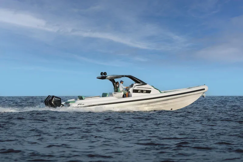 Slide: The Image of 2025 Panamera Yacht PY 110 Veloce cruising on open sea under clear blue sky. - 5