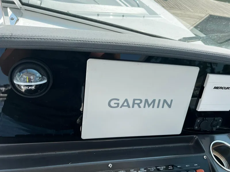 Slide: The Image of Garmin navigation system on 2023 Blackfin 272 DC boat dashboard. - 15